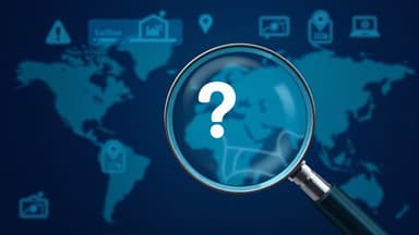 Frustrated business owner looking at a blank Google Maps search result on their laptop with a question mark icon overlay